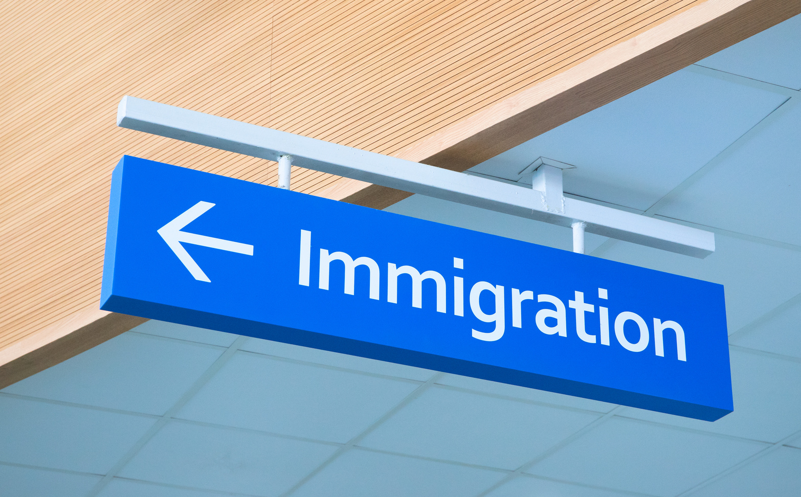 Immigration sign in airport. Airport inscription pointer. Immigration concept photo. Passport control sign